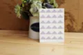 Close up of red and blue striped photo corner stickers, ideal DIY scrapbook accessory. - Red Blue Stripes