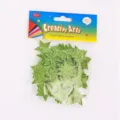 Nahaufnahme von grünen Glitzer-Schaumstoff-Sternaufklebern für kreative DIY-Kinderbastelprojekte. - 60 Stück/Packung / Grasgrün