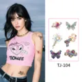 Waterproof laser gold tattoo stickers set featuring trendy butterfly and star designs. - Gold Stamping Style TJ-104 / 105x150mm