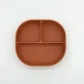 Silicone baby suction plate with three compartments in terracotta color for infants feeding. - 1149 Brick Red