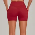 Red high-waisted yoga shorts with side pockets, stretchy fitness biker shorts for women. - S / Bottoms / Ruby Red