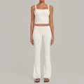 White yoga set two piece outfit tank top and high waist flare pants for fitness gym. - S / Top And Bottom / Beige