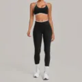 Set da yoga nero con reggiseno sportivo con bordo bianco e leggings a vita alta variante - Taglia S / Top E Pantaloni / Nero