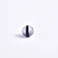 Macro detail of purple glazed glass bead with black stripe, perfect for DIY jewelry making. - Purple