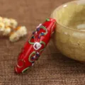 Handcrafted red glazed waist drum pendant, intricate 3D decorative patterns, DIY jewelry accessory. - Red Porcelain