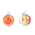 Detailed shot of handmade glass space galaxy pendant with red and yellow swirl patterns inside. - Red Base Single Ball
