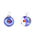 Close up of handmade galaxy glass orb pendant featuring a deep blue universe and swirling nebula. - Single Ball Blue Base Red