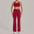 Burgundy athletic yoga set with a breathable sports bra and high-waisted flare pants. - S / Top And Bottom / Ruby Red