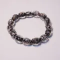 Colorful luminous glass bead bracelet, handmade retro style jewelry accessory for men and women. - Multicolor on Black