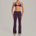 Dark purple halter sports bra and fold-over flare yoga pants set, perfect for fitness workouts. - Blackberry Purple