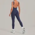 Blue backless yoga jumpsuit for women, sleeveless fitness activewear bodysuit for running. - Midnight Blue