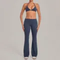Dark blue halter sports bra and folded waist flare yoga pants set for fitness and workouts. - Medallion Blue