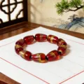 Red teardrop glass bead bracelet with gold foil inclusions, elegant Chinese style charm jewelry. - 12*20mm String of 10 Beads / Red