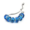Élégant bracelet en chaîne serpent argentée avec de superbes perles charmes en verre de Murano. - Bleu lac style D