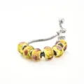 Bracelet charms en chaine serpent argentée avec perles en verre de murano rose et jaune - E céramique jaune