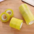 Transparent yellow adhesive tape for office stationery and school use, clear packing roll - Transparent Yellow