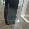 Acrylic bookends detail view, transparent and black L-shaped desktop book organizer shelf. - 1 Piece/Pack / Clear
