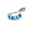 Silberne Schlangenkette Charm Armband mit hellblauen facettierten Glasperlen fuer Damen Stil. - 9*14mm / Stil B Lake Blue