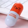 Mini boligrafo de capsula con cara sonriente bonita papeleria para estudiantes regalo creativo - Funda Naranja
