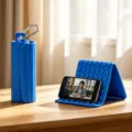 Dark blue foldable silicone phone stand with carabiner, flexible portable desktop holder. - Neutral English Packaging / Blue