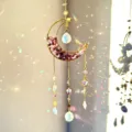 Detailed view of the crystal sun catcher featuring a golden crescent moon and colorful light. - Purple Crystal / Approx 41-43cm