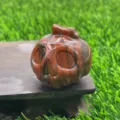 Natural crystal pumpkin skull carving, 3.5cm gemstone ghost figurine for home decor. - Red Sesame