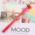 Cute Christmas reindeer neutral pen with red body and adorable cartoon topper for students. - Joyful Elk