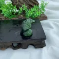 Detail shot of 3cm natural stone eagle carving, showing fine texture and green gemstone craft. - Ruby Zoisite