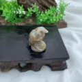 Close-up of a 3cm natural stone carved eagle figurine, exquisite gemstone bird desktop decor. - Indian Red Jade