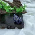 Hand-carved crystal cat figurine, natural gemstone cute kitten ornament detail view. - Blue Sodalite / 3cm