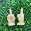 Natural stone middle finger hand carving figurine, 5cm creative semi-precious stone decor. - Golden Steatite
