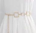 Gold metal waist chain belt featuring square geometric links, elegant dress accessory for women. - Gold