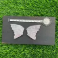 Detailed view of natural pink crystal butterfly wings crystal specimen measuring ten cm. - Rose Quartz