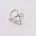 Detailed view of an elegant silver-tone metal and pearl geometric silk scarf buckle ring accessory. - L / Silver