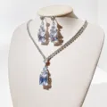 Detailed shot of sparkling zircon necklace and earrings jewelry set with square stones. - Earrings and Necklace 2-Piece Set