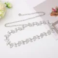 Detail view of the retro silver butterfly waist chain, perfect bohemian dress accessory belt. - White K/Silver