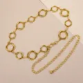 Details of vintage gold metal waist chain with geometric rings, retro western style jewelry. - Antique Gold