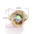 Golden woven textured shirt button cover featuring a sparkling multi-colored faceted zircon stone. - 9#