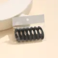 Variante clip fibbia per sciarpa in plastica ovale nera, elegante accessorio di abbigliamento. - XP8-5