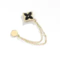 Magnetische kledingclip met zwart bloemmotief, metalen broekmanchetpin en broche. - A-19