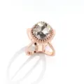 Rose gold tone metal scarf ring variant with a large sparkling round crystal centerpiece. - 633 Rose Gold
