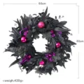 Black artificial Halloween wreath featuring maple leaves pink balls and purple ribbons 60cm. - Halloween Wreath