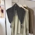 Detailed view of the Korean style black and white plaid double-sided scarf with beaded ties. - 07_Black Plaid