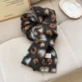 Detailed view of the Korean style fluffy leopard print winter warm soft wool scarf. - Coffee-Leopard
