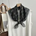 Detail view of the elegant geometric print square scarf, lightweight fabric, stylish neck styling. - SKU-06