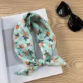 Detail shot of the pastoral style green checkered scarf with cute orange fruit prints, soft cotton. - Picture #17