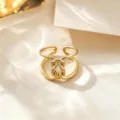 Fashion titanium steel open ring, trendy niche design adjustable gold ring, main view. - Knotted Style / Gold