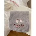 Grey knitted winter scarf featuring cute skiing bears embroidery and stylish text pattern. - Light Gray
