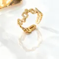 Anillo abierto de acero de titanio dorado con diseño geométrico cuadrado hueco elegante. - Anillo de Textura Tipo 0 / Dorado