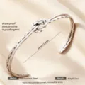 Edelstahl Knoten Armreif, wasserdichter minimalistischer offener Armschmuck Damen. - Silber Doppelknoten Textur
